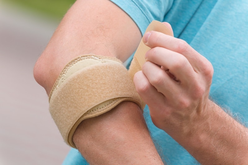 Man wearing elbow brace elbow brace